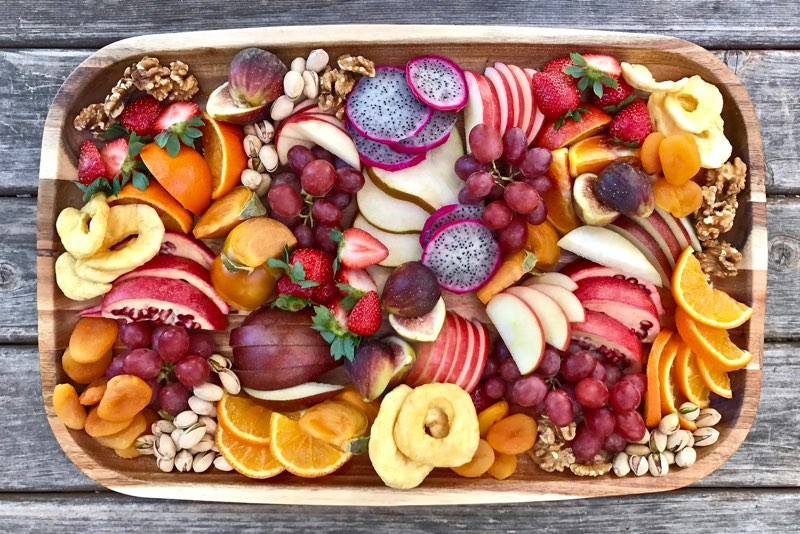 Large platter of sliced fresh seasonal fruit